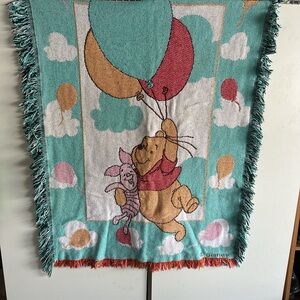 Disney Winnie the Pooh Red and Orange Fringe Fabric